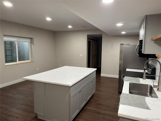 864 Penstemon Dr, Henderson, CO 80640