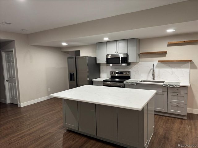 864 Penstemon Dr, Henderson, CO 80640