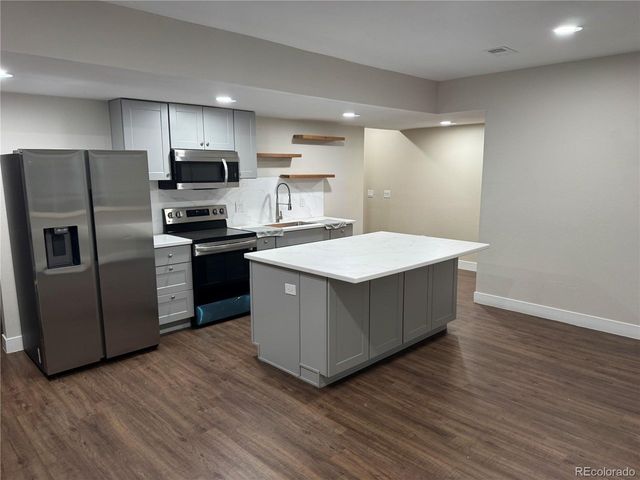 864 Penstemon Dr, Henderson, CO 80640