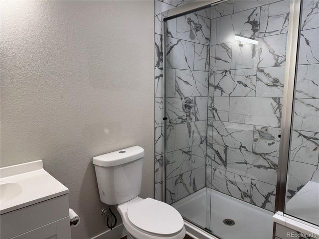 864 Penstemon Dr, Henderson, CO 80640