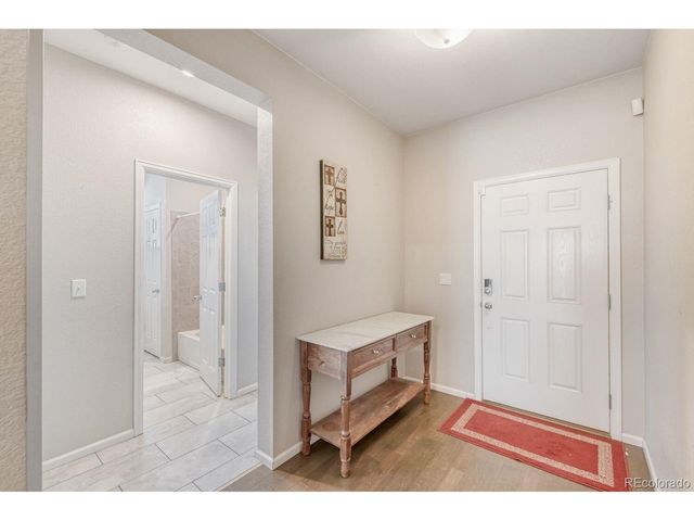 864 Penstemon Dr, Henderson, CO 80640