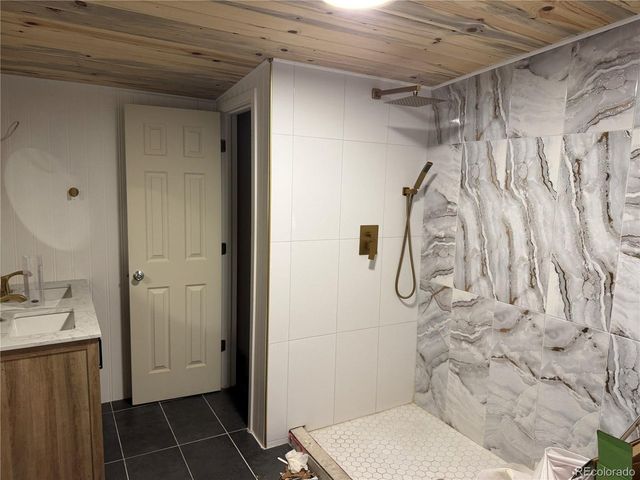 864 Penstemon Dr, Henderson, CO 80640