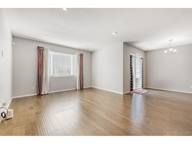 864 Penstemon Dr, Henderson, CO 80640