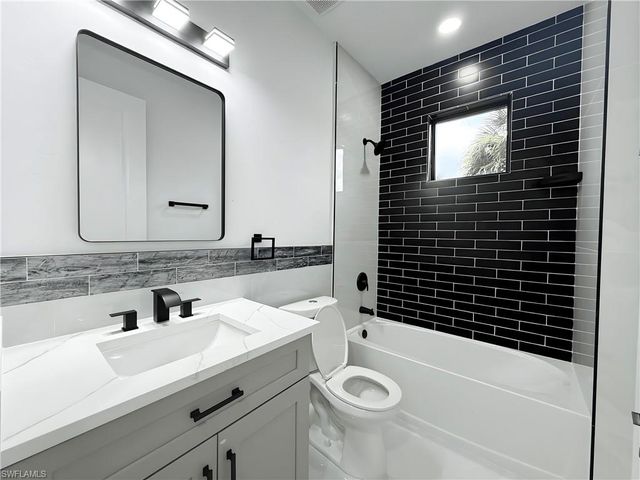 1402 Columbus AVE, Lehigh Acres, FL 33972