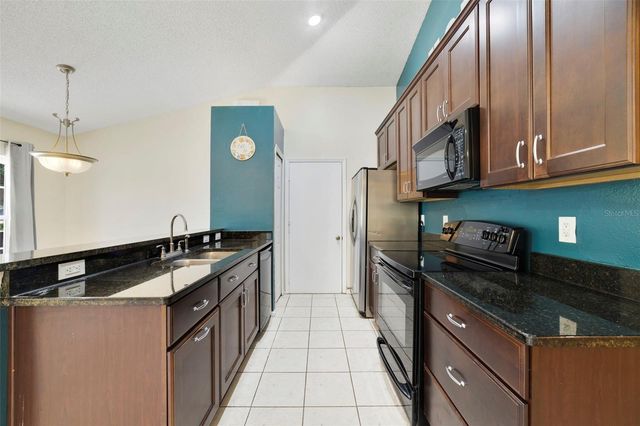 7692 PINE FORK DRIVE, Orlando, FL 32822