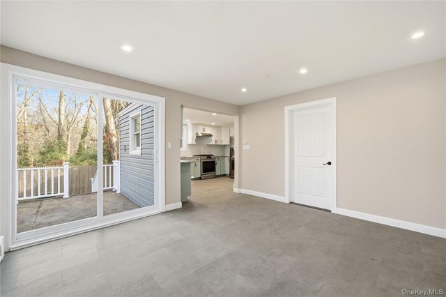 15 Corchaug Trail, Ridge, NY 11961