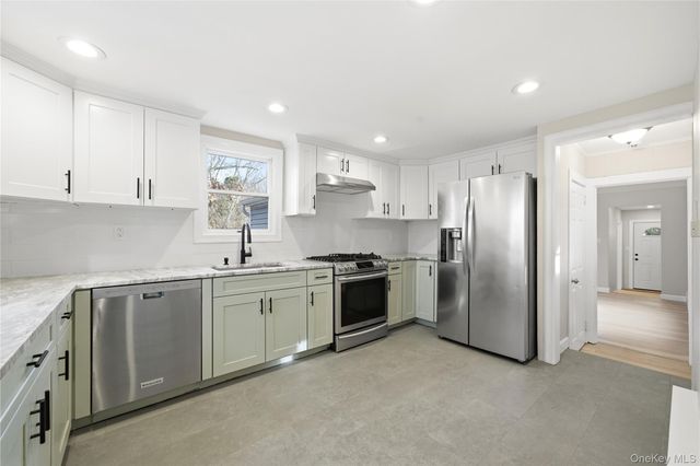 15 Corchaug Trail, Ridge, NY 11961