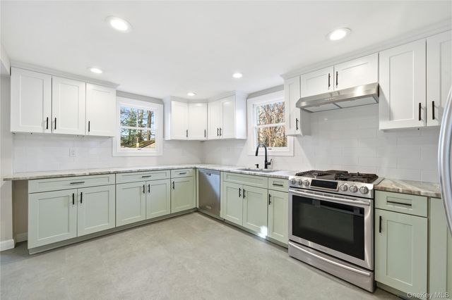 15 Corchaug Trail, Ridge, NY 11961