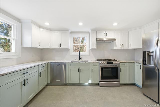 15 Corchaug Trail, Ridge, NY 11961