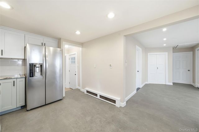 15 Corchaug Trail, Ridge, NY 11961