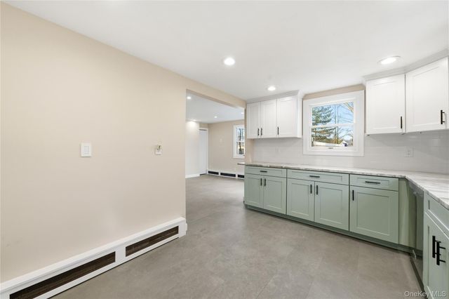 15 Corchaug Trail, Ridge, NY 11961