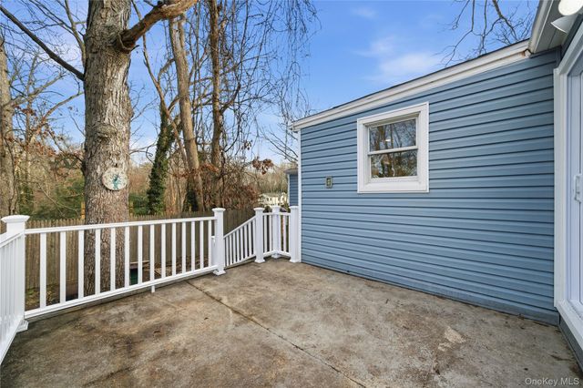 15 Corchaug Trail, Ridge, NY 11961