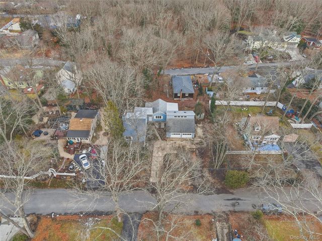 15 Corchaug Trail, Ridge, NY 11961