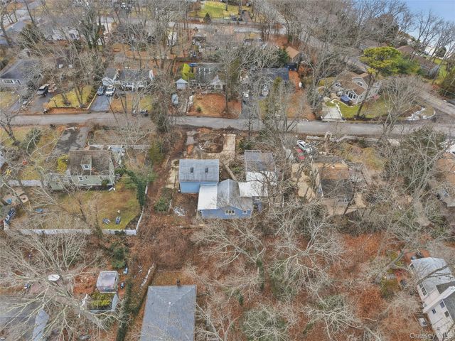 15 Corchaug Trail, Ridge, NY 11961