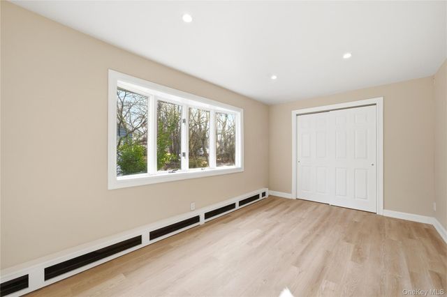 15 Corchaug Trail, Ridge, NY 11961