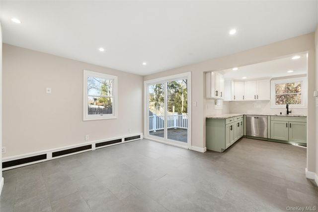 15 Corchaug Trail, Ridge, NY 11961