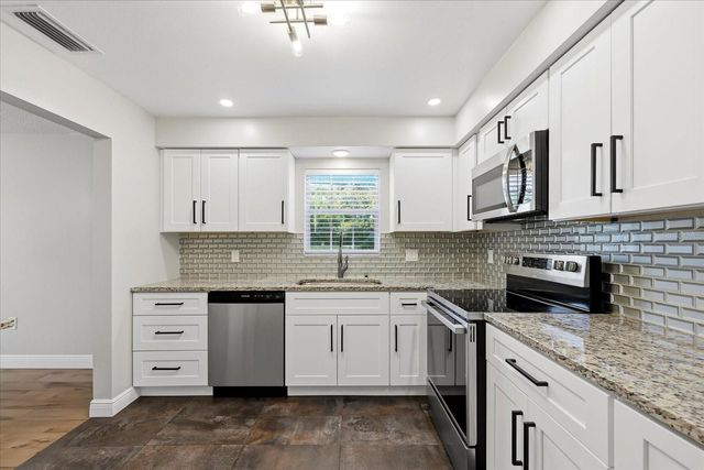 1706 BELLEAIR FOREST DRIVE 128, Belleair, FL 33756