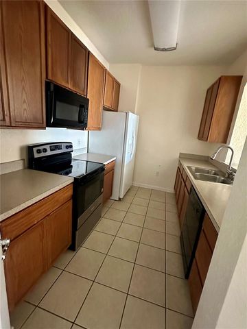 6402 CAVA ALTA DRIVE 410, Orlando, FL 32835