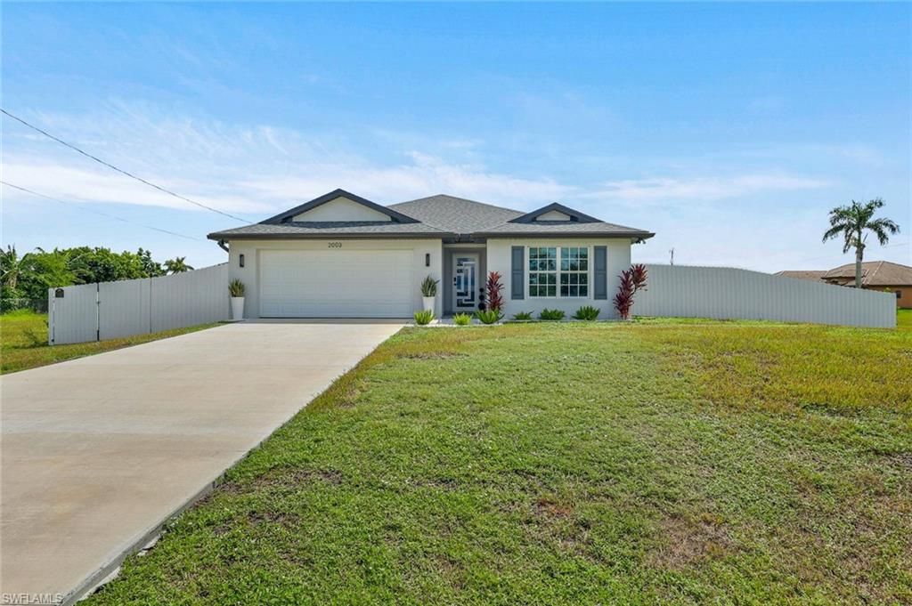 2003 NE 6th AVE, CAPE CORAL, FL 33909 — exterior