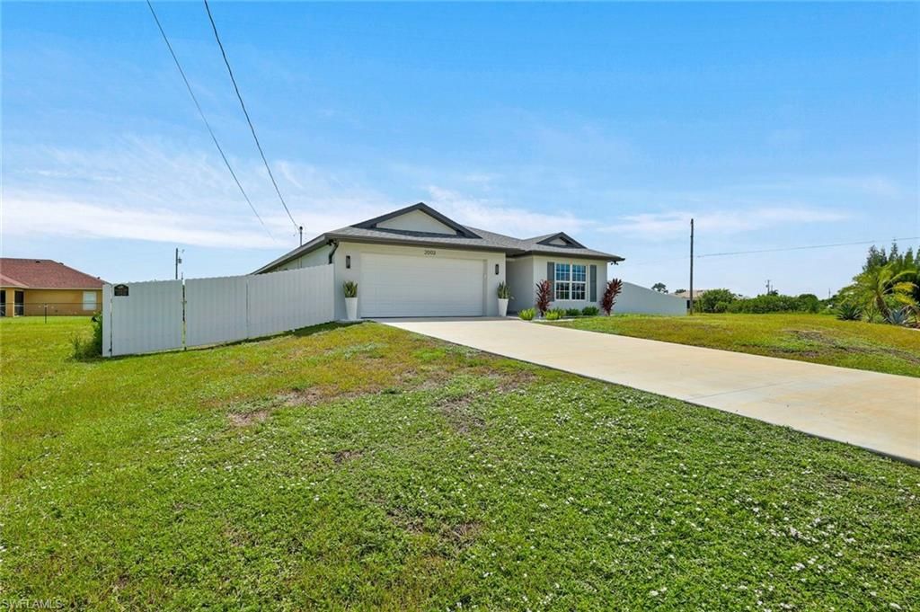 2003 NE 6th AVE, CAPE CORAL, FL 33909 — photo 2