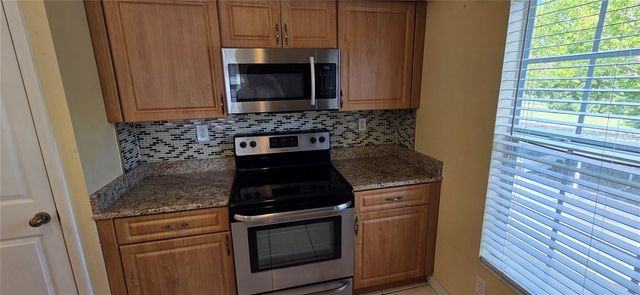 9306 LAKE CHASE ISLAND WAY, Tampa, FL 33626