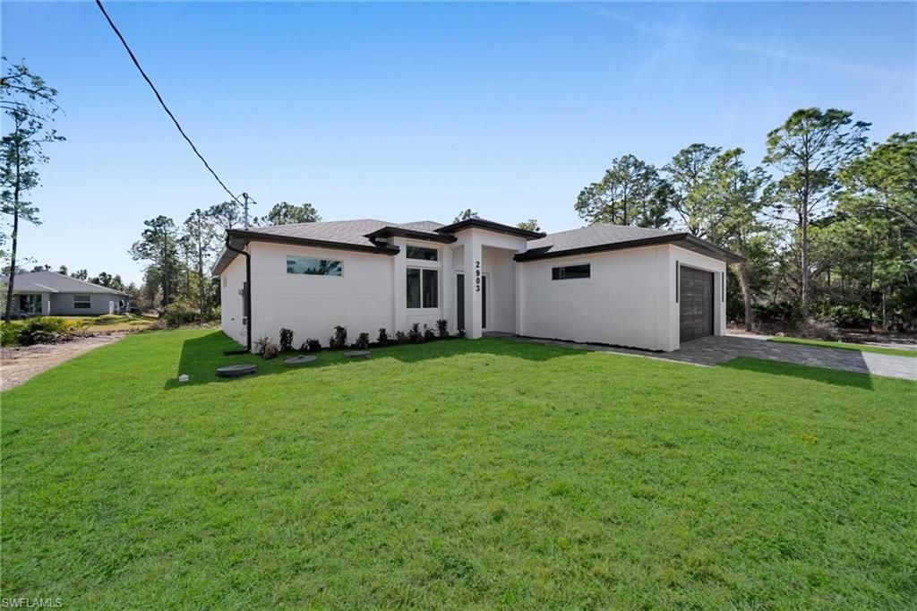 2903 49th ST W, LEHIGH ACRES, FL 33971 — photo 2