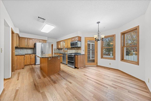 9130 Hidden Meadow Road, Woodbury, MN 55125