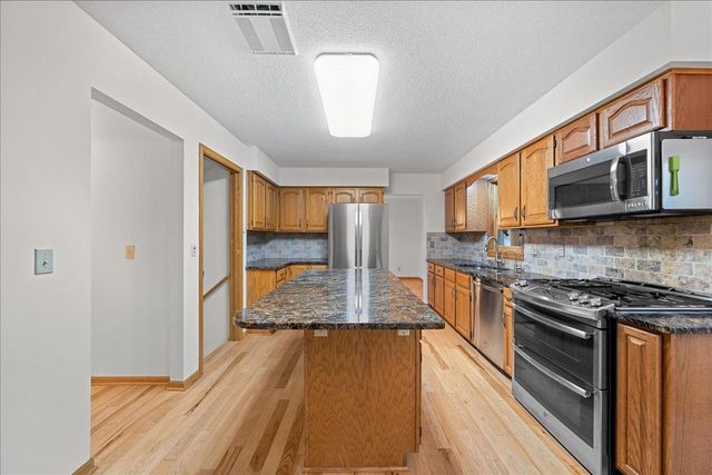 9130 Hidden Meadow Road, Woodbury, MN 55125