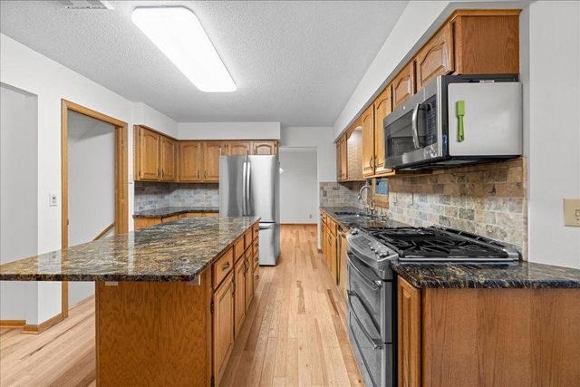 9130 Hidden Meadow Road, Woodbury, MN 55125