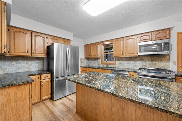 9130 Hidden Meadow Road, Woodbury, MN 55125