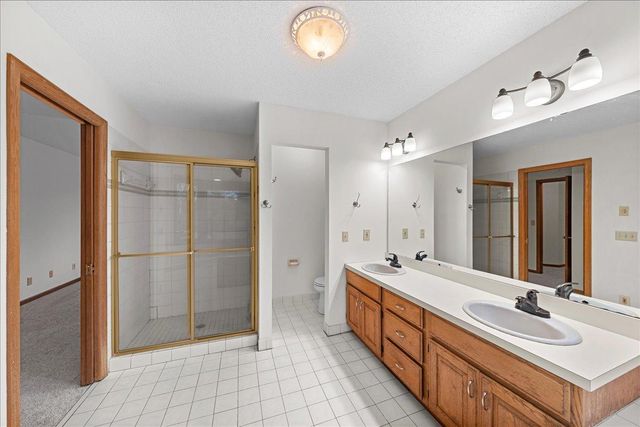 9130 Hidden Meadow Road, Woodbury, MN 55125