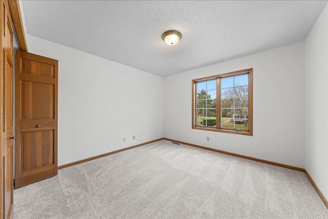 9130 Hidden Meadow Road, Woodbury, MN 55125