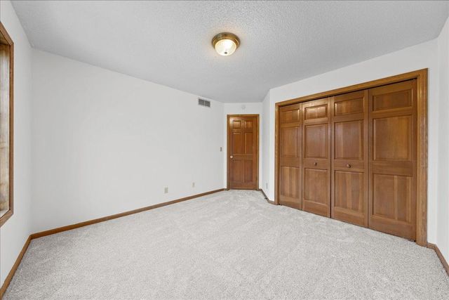 9130 Hidden Meadow Road, Woodbury, MN 55125