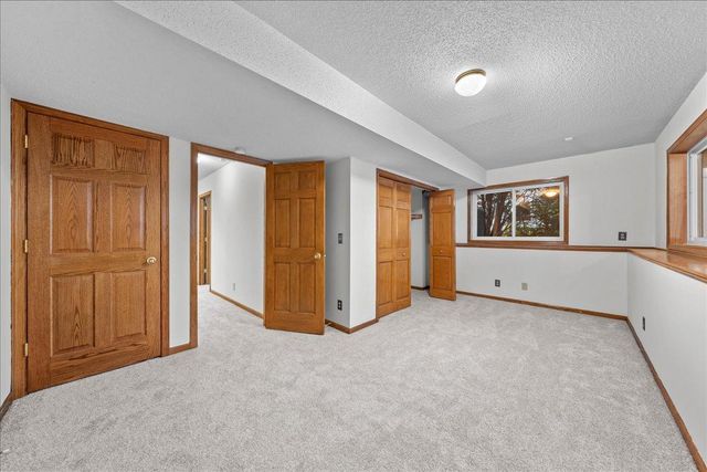 9130 Hidden Meadow Road, Woodbury, MN 55125