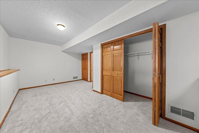 9130 Hidden Meadow Road, Woodbury, MN 55125