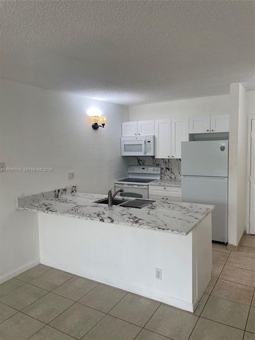 2401 Riverside Dr 203-B, Coral Springs, FL 33065