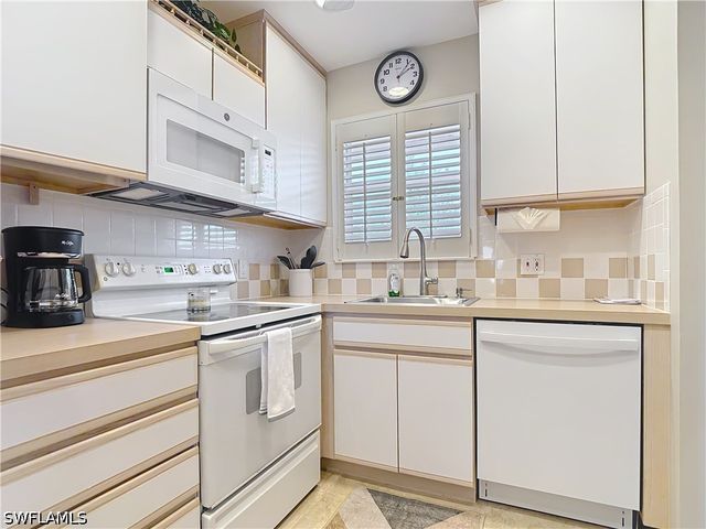 150 TURTLE LAKE CT 309, Naples, FL 34105