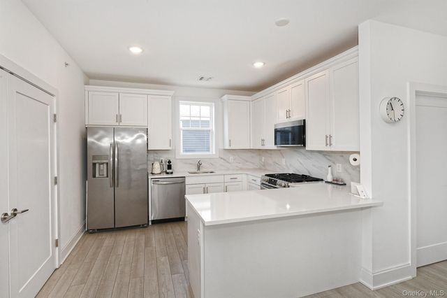 416 White Rose Lane, East Meadow, NY 11554