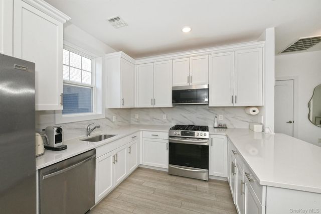416 White Rose Lane, East Meadow, NY 11554