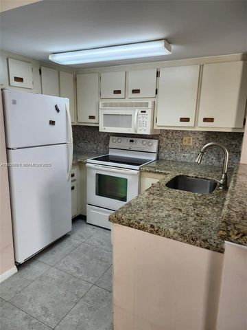 665 NW 85th Pl 10-212, Miami, FL 33126