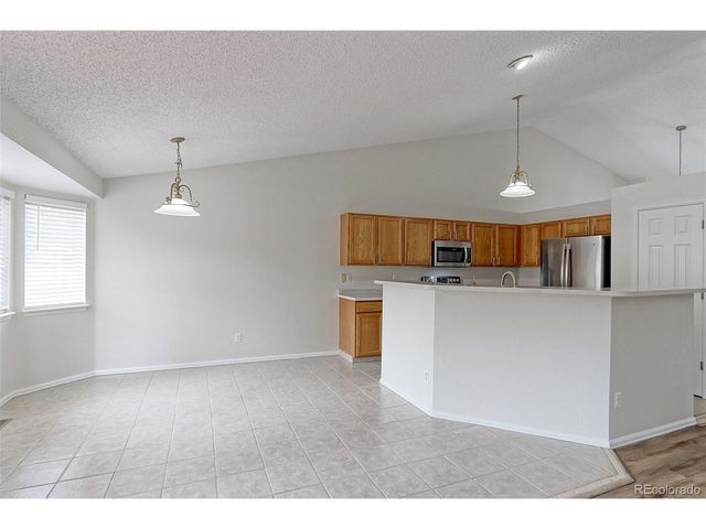 2433 Wolf Creek Dr, Brighton, CO 80601