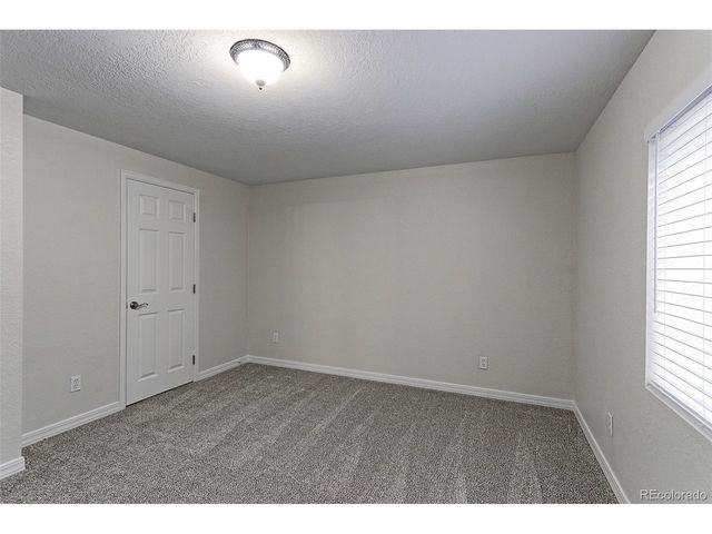 2433 Wolf Creek Dr, Brighton, CO 80601