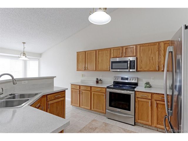 2433 Wolf Creek Dr, Brighton, CO 80601