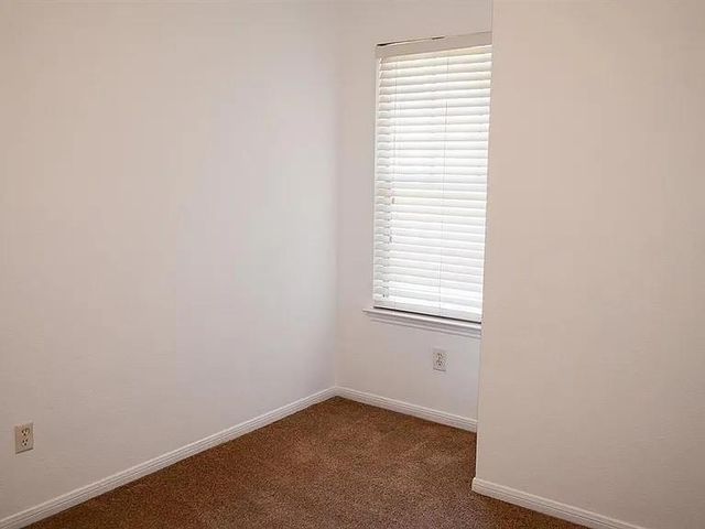 63 Scarlet Woods Court, Spring, TX 77380