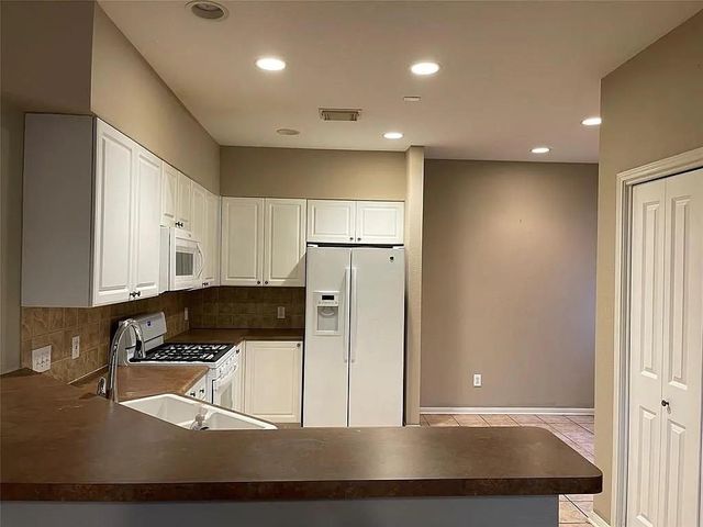 63 Scarlet Woods Court, Spring, TX 77380