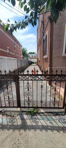 3216 99th Street, East Elmhurst, NY 11369