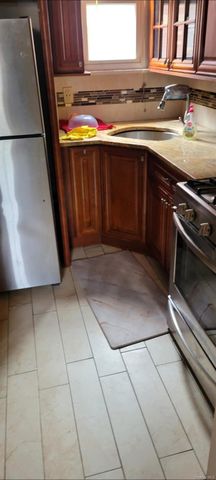 3216 99th Street, East Elmhurst, NY 11369