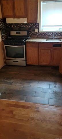 3216 99th Street, East Elmhurst, NY 11369