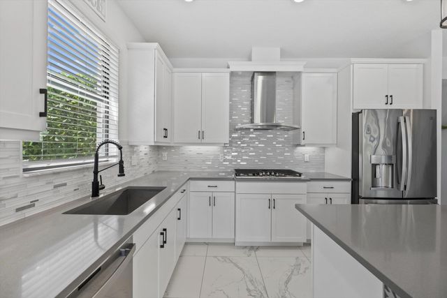 8779 Grand Prix Lane, Boynton Beach, FL 33472