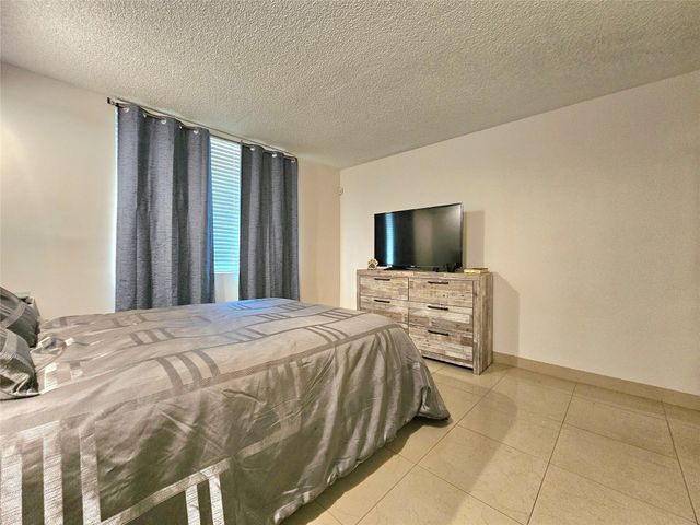 701 Lyons Road 13103, Coconut Creek, FL 33063
